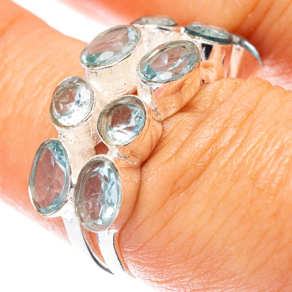 Sterling silver ring with oval blue gemstone settings, size 6.5