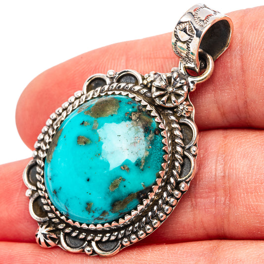 Sterling silver Kingman turquoise oval pendant with ornate rope bezel and bail