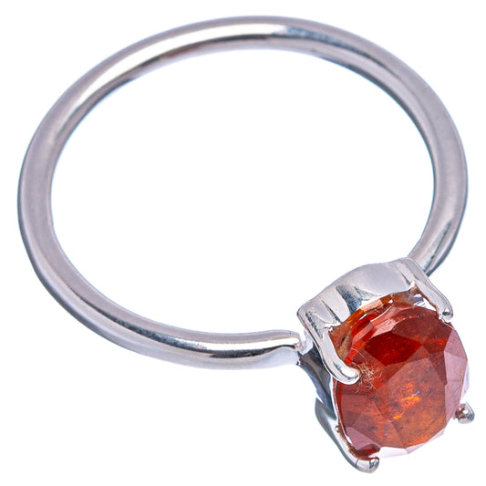Sterling silver ring with orange kyanite oval stone, raised prong setting