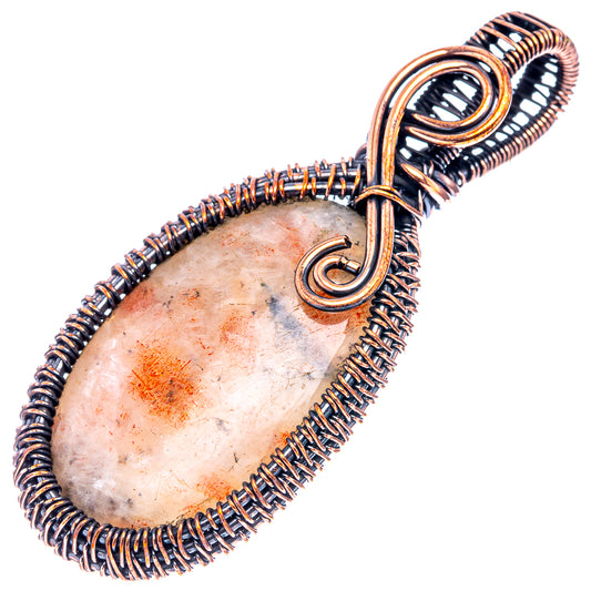 Oxidized copper wire-wrapped teardrop pendant with light stone center