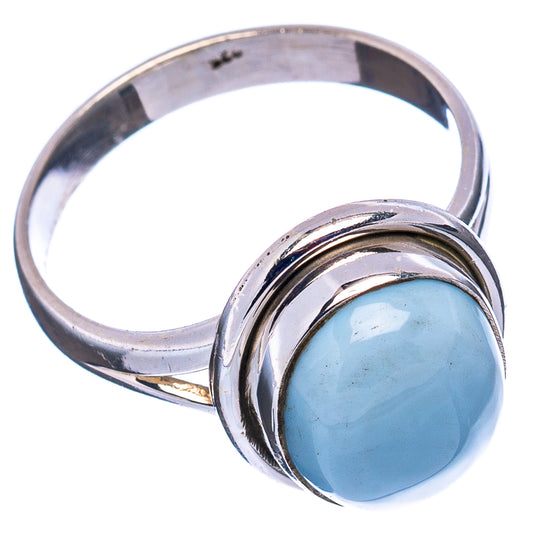 Sterling silver ring with oval pale-blue stone and raised double bezel