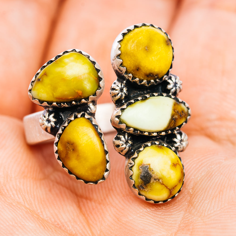 Sterling silver statement ring featuring stacked yellow and white cabochon stones
