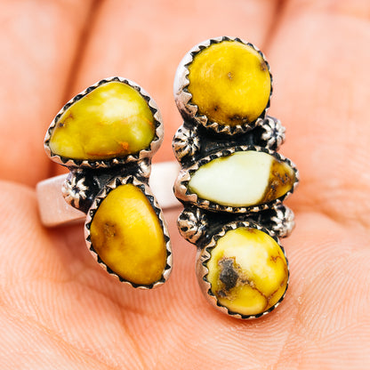 Sterling silver statement ring featuring stacked yellow and white cabochon stones
