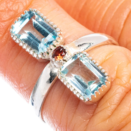 Sterling silver ring with two rectangular blue stones and small red accent
