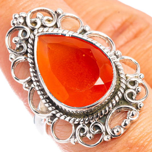 Sterling silver oval carnelian ring with ornate filigree setting, orange gemstone