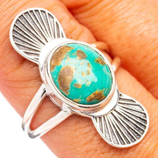 Sterling silver turquoise cabochon ring with oval Mojave-style stone and fan motifs