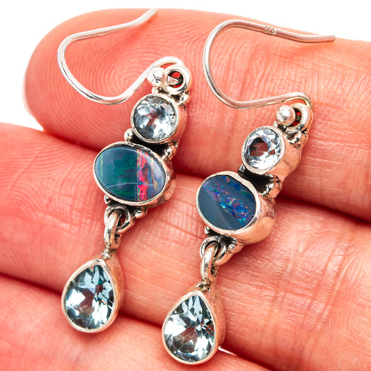 Sterling silver drop earrings with blue opal and light blue teardrop gemstones