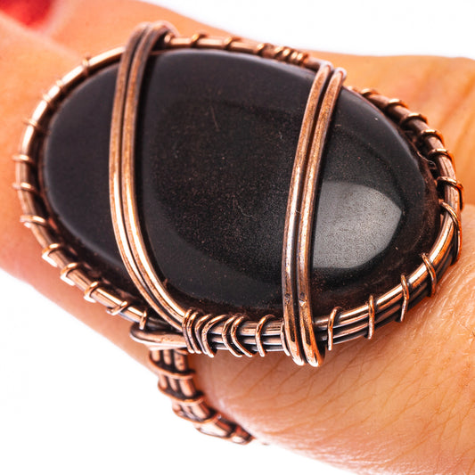 Size 7 jet ring with oval black stone, oxidized copper wire wrap