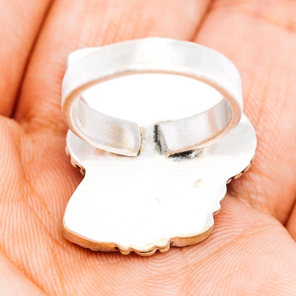 Sterling silver adjustable ring band with open back and hammered texture on inside