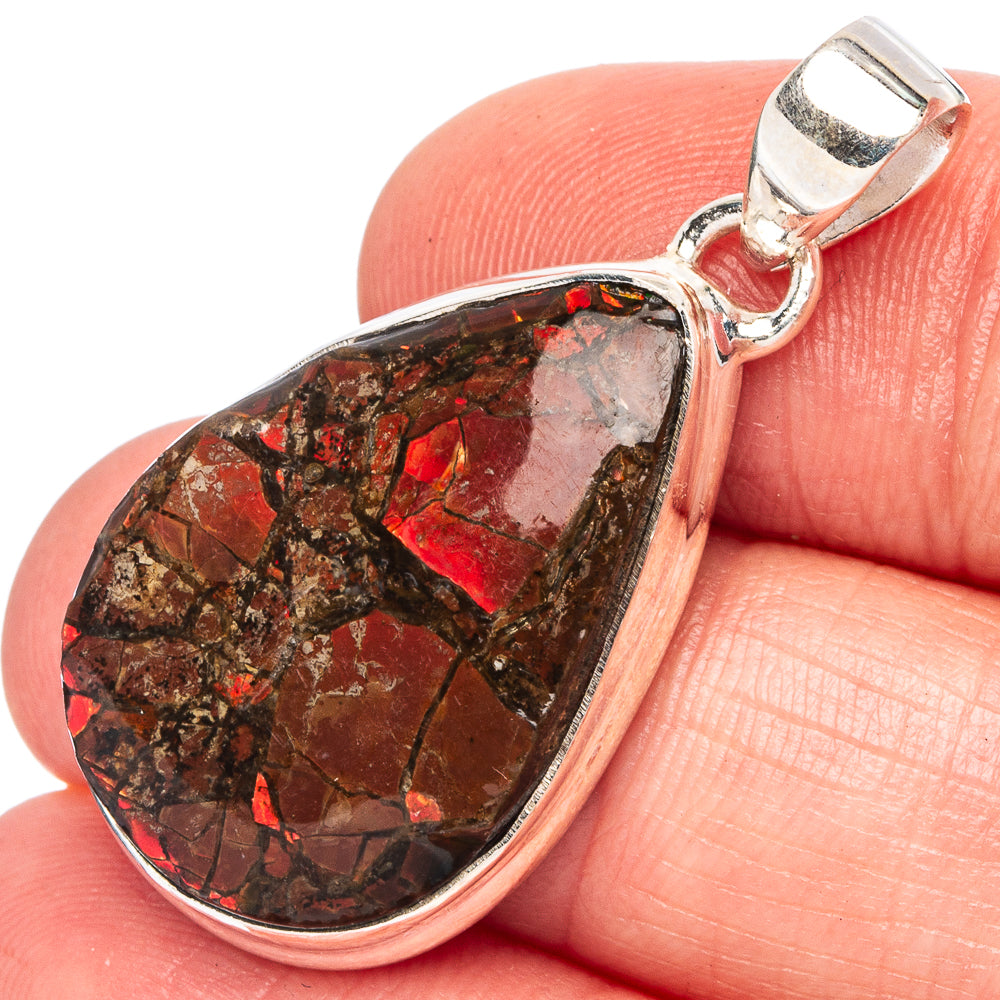 Teardrop ammolite pendant with red and black stone in 925 sterling silver setting