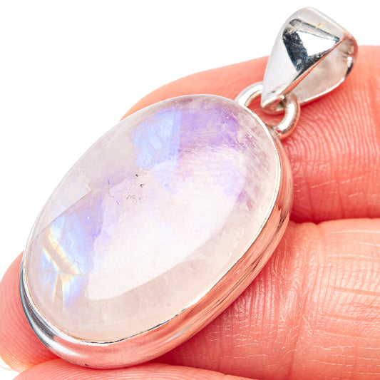 Sterling silver oval opal pendant with iridescent pale pink and lavender cabochon