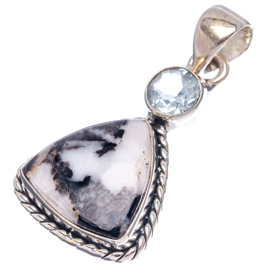 Sterling silver pendant with round blue gemstone and teardrop white/black stone bail