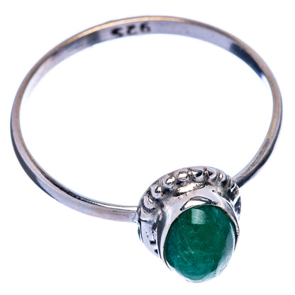 Sterling silver ring with oval emerald-green cabochon and textured shoulders