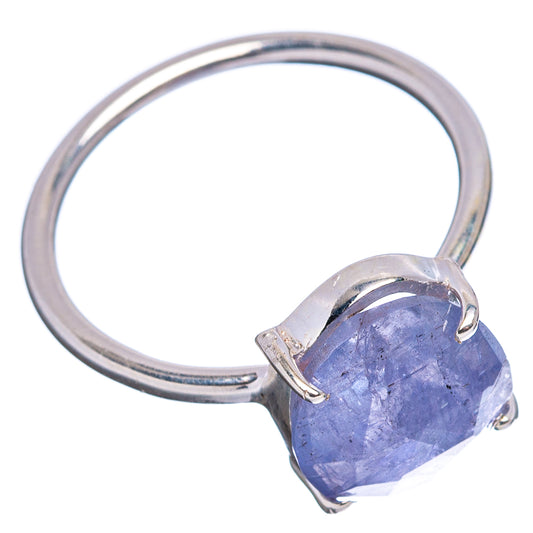 Sterling silver tanzanite ring with three-prong blue stone, contoured band