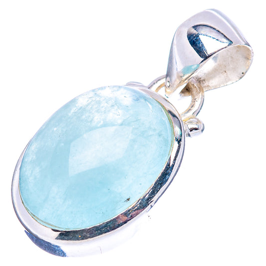 Oval aquamarine pendant with polished .925 sterling silver frame and bail, light blue cabochon.