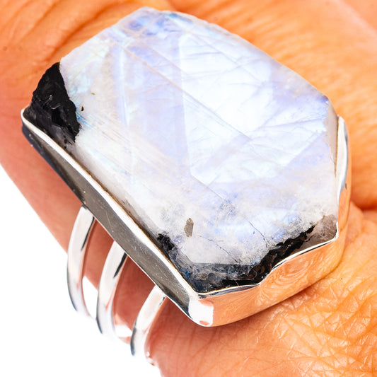 Oval rainbow moonstone ring with .925 sterling silver bezel, visible gemstone