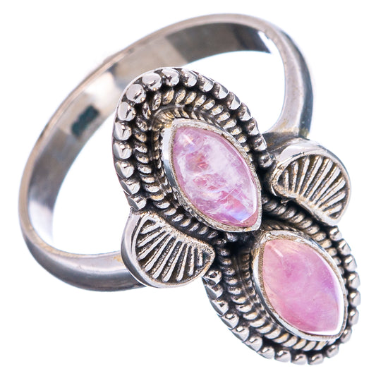 Sterling silver ring featuring two pink oval moonstone cabochons in textured bezels