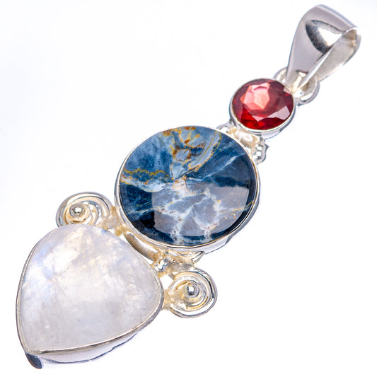 Sterling silver gemstone pendant with blue oval center, red round top, and white pear stone