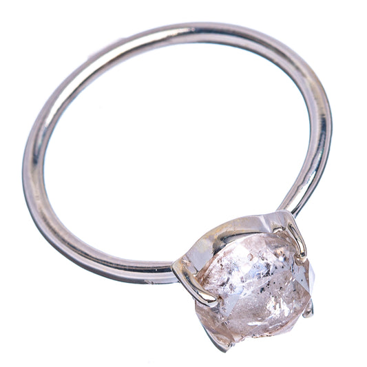 Oval faceted cacoxenite ring, .925 sterling silver band with four-prong setting