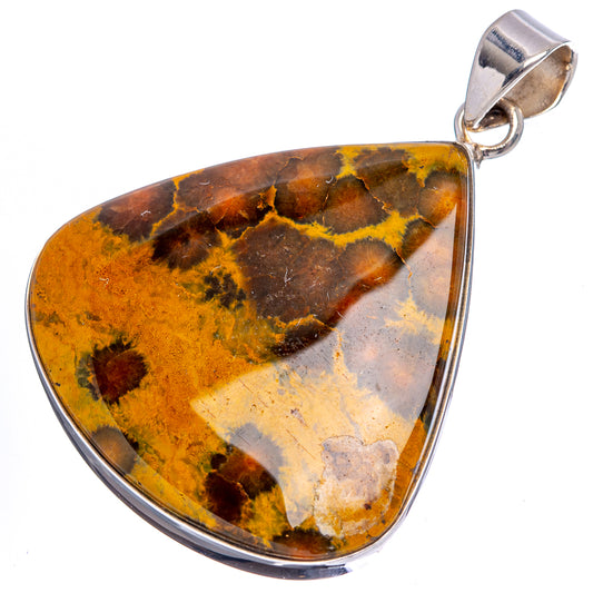 Teardrop ocean jasper pendant, .925 sterling silver bezel around mottled yellow-brown stone