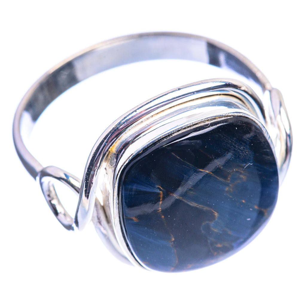 Sterling silver ring with dark blue oval pietersite cabochon and twisted band detail
