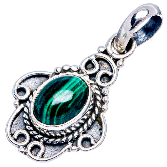 Sterling silver malachite pendant with oval green cabochon and decorative side scrollwork