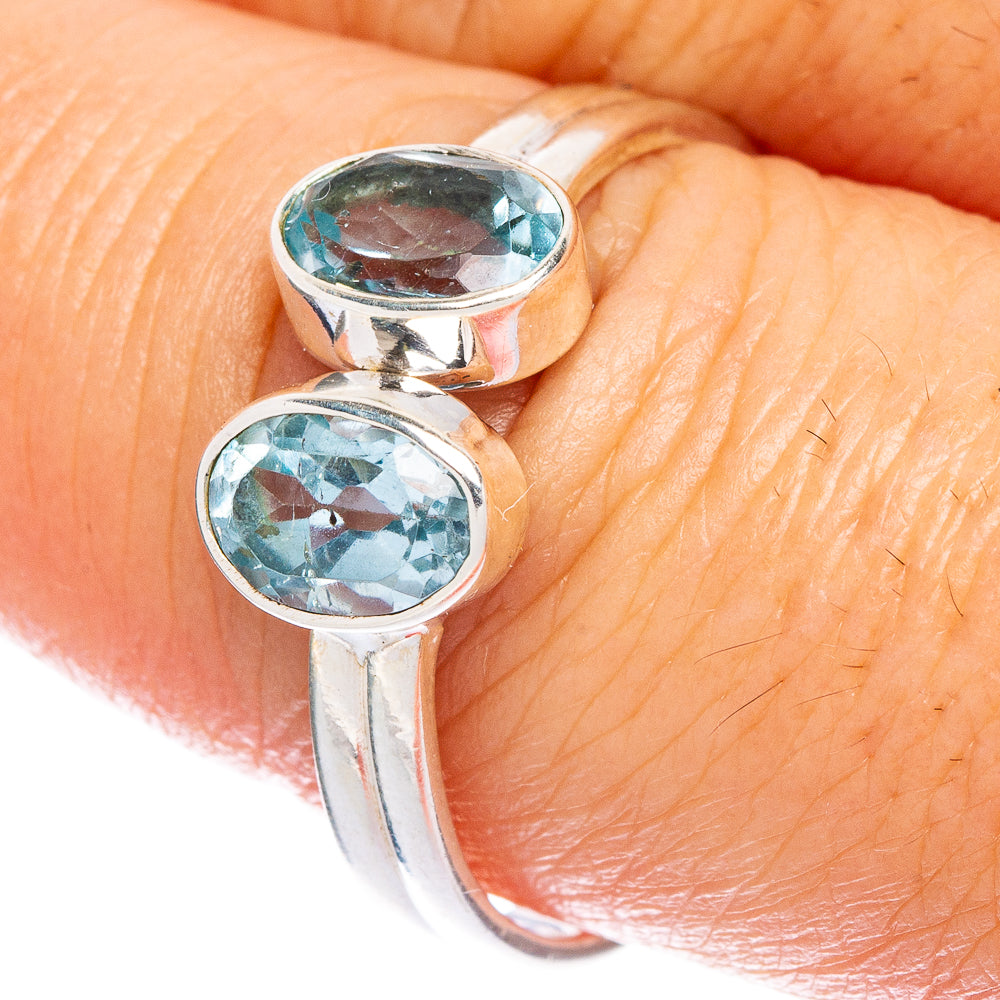 Sterling silver dainty ring with two oval blue topaz stones on the band