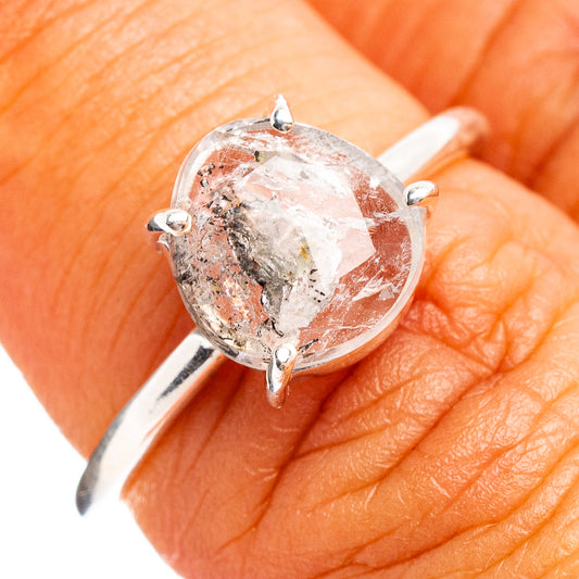 Faceted cacoxenite ring in .925 sterling silver with oval crystal in prong setting
