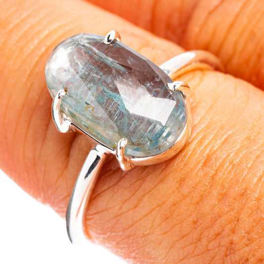 Sterling silver ring with oval faceted aquamarine gemstone set in prongs