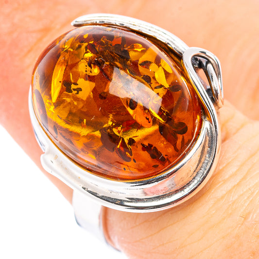 Amber oval cabochon ring with leaf pattern, oval setting, .925 sterling silver