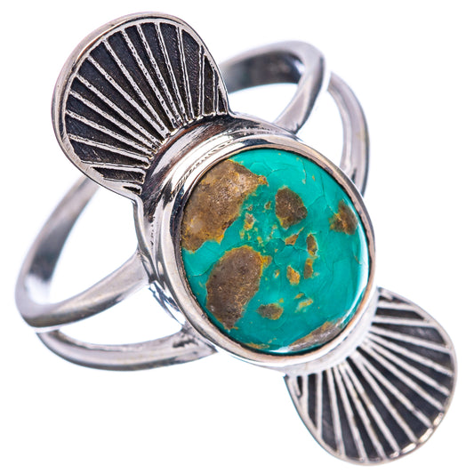 Sterling silver turquoise cabochon ring, oval stone set with fan-shaped side details