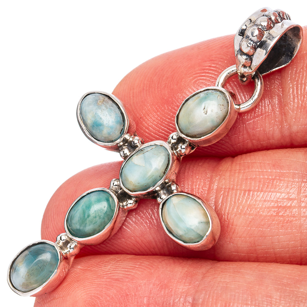 Larimar cross pendant in 925 sterling silver with oval gemstone settings