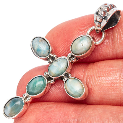 Larimar cross pendant in 925 sterling silver with oval gemstone settings