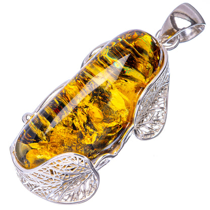Oval Baltic amber cabochon sterling silver pendant with decorative cutout frame