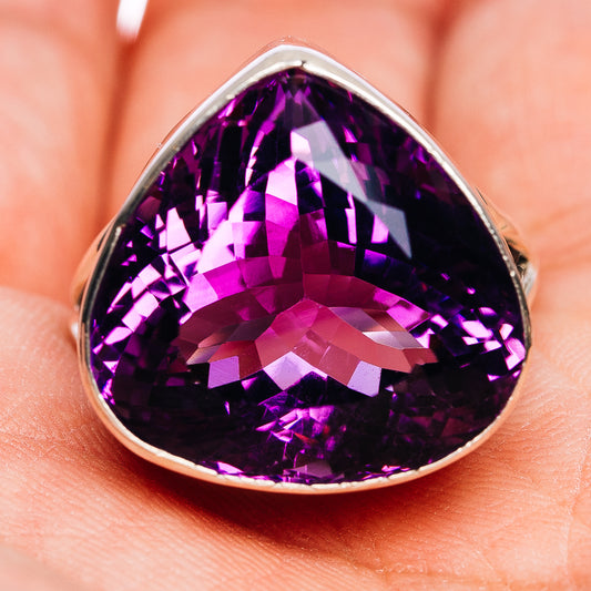 Sterling silver amethyst faceted teardrop ring, deep purple stone in bezel setting