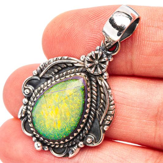 Native Style sterling silver opal pendant with oval green-yellow opal, floral frame.