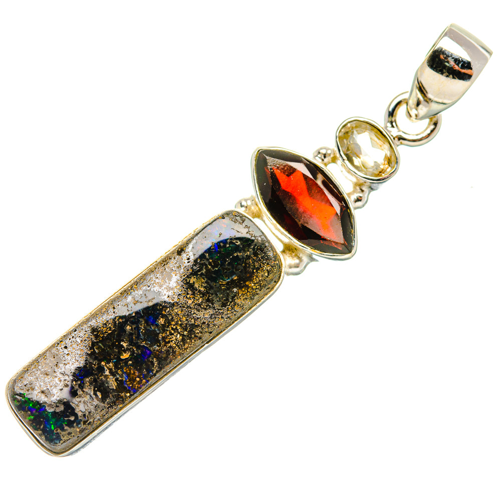 925 sterling silver pendant with elongated black-and-gold stone and marquise red gemstone