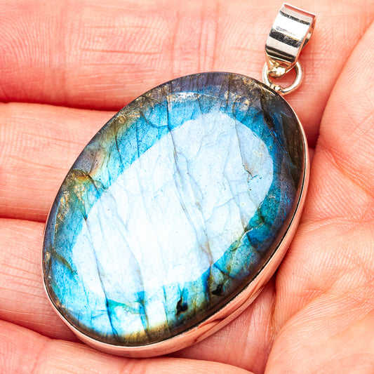 Oval labradorite pendant with blue flash gemstone and .925 sterling silver bail