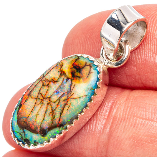 Sterling silver opal pendant with rainbow iridescent teardrop stone