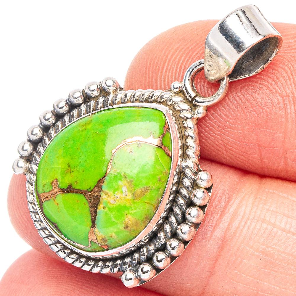 Green turquoise oval pendant with sterling silver ornate bezel, bail loop