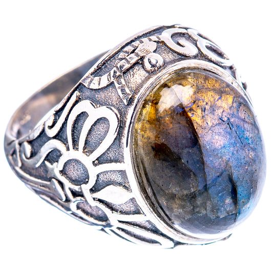 Sterling silver filigree ring with oval blue-and-gold labradorite cabochon and side engraving