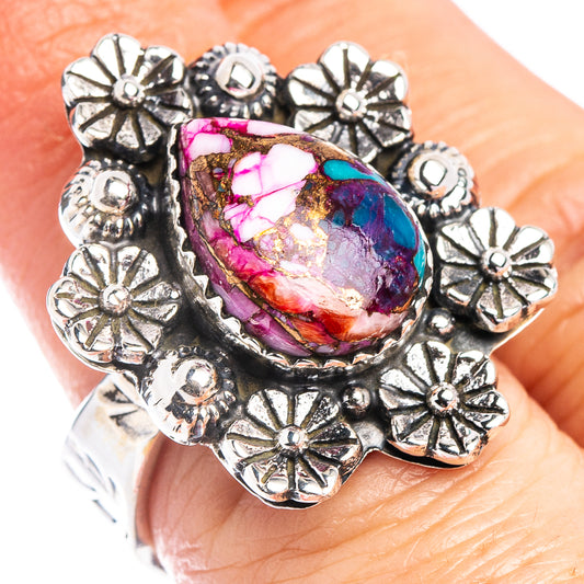 Sterling silver ring with floral edging and teardrop multicolor gemstone centerpiece