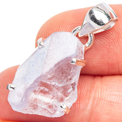 Sterling silver prong-set dumortierite pendant with rough blue stone