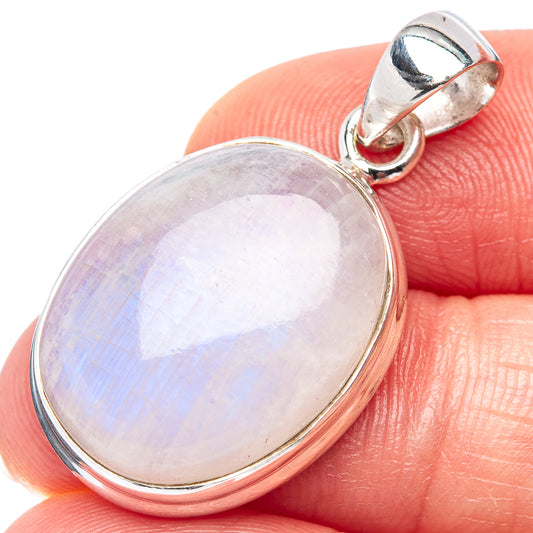Oval rainbow moonstone pendant in .925 sterling silver, with hinged bail, close-up