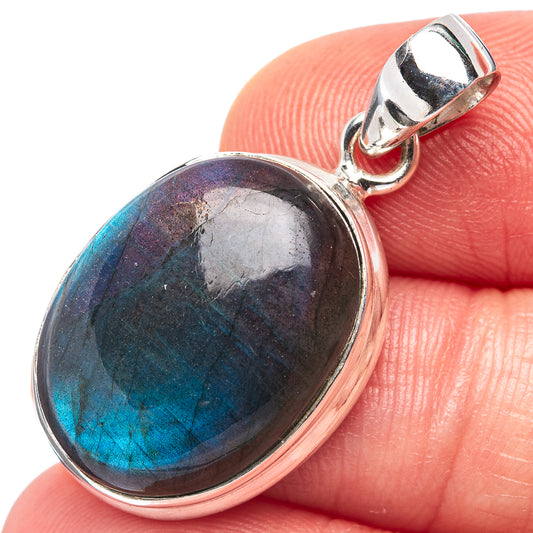 Oval labradorite gemstone pendant in .925 sterling silver bezel with hinged bail