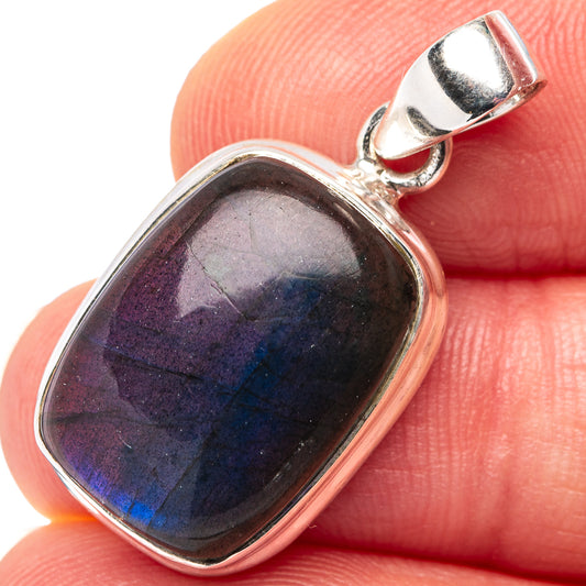 Sterling silver labradorite pendant with dark purple-blue iridescent oval cabochon bail