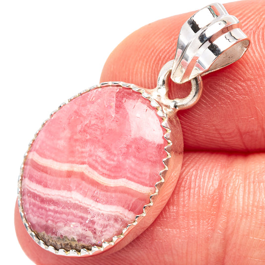 Oval rhodochrosite pendant with pink striped stone in .925 sterling silver bezel