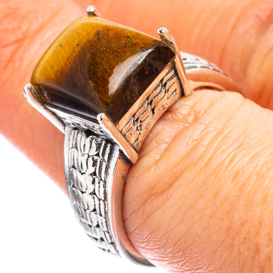 Sterling silver ring with filigree band and tiger’s eye square cabochon