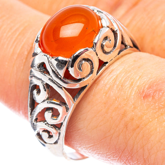 Orange carnelian cabochon sterling silver filigree ring with scroll detailing