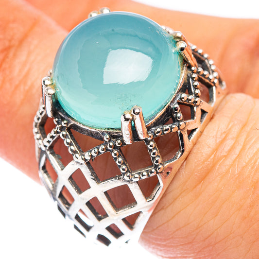 Aqua chalcedony filigree ring with oval turquoise stone, openwork lattice and silver band